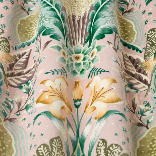 Pink floral fabric swatch with green and gold botanical motifs