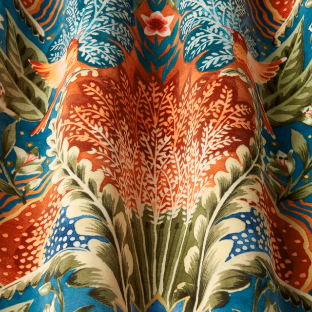 Bold teal, rust and olive botanical tapestry fabric with cream leaf motifs