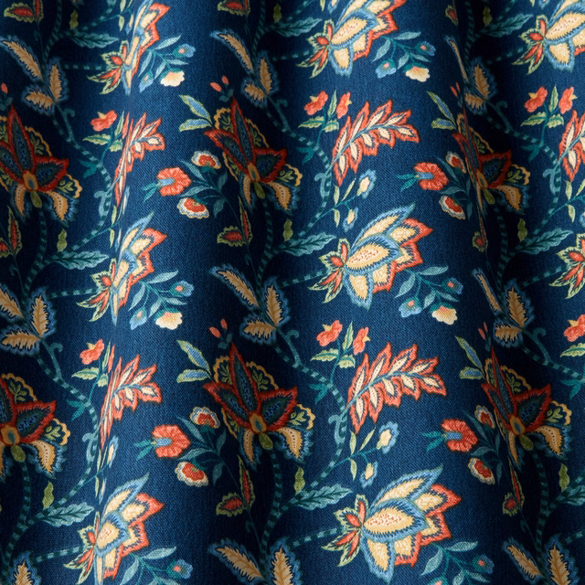 Midnight blue cotton fabric with coral and teal floral trail print