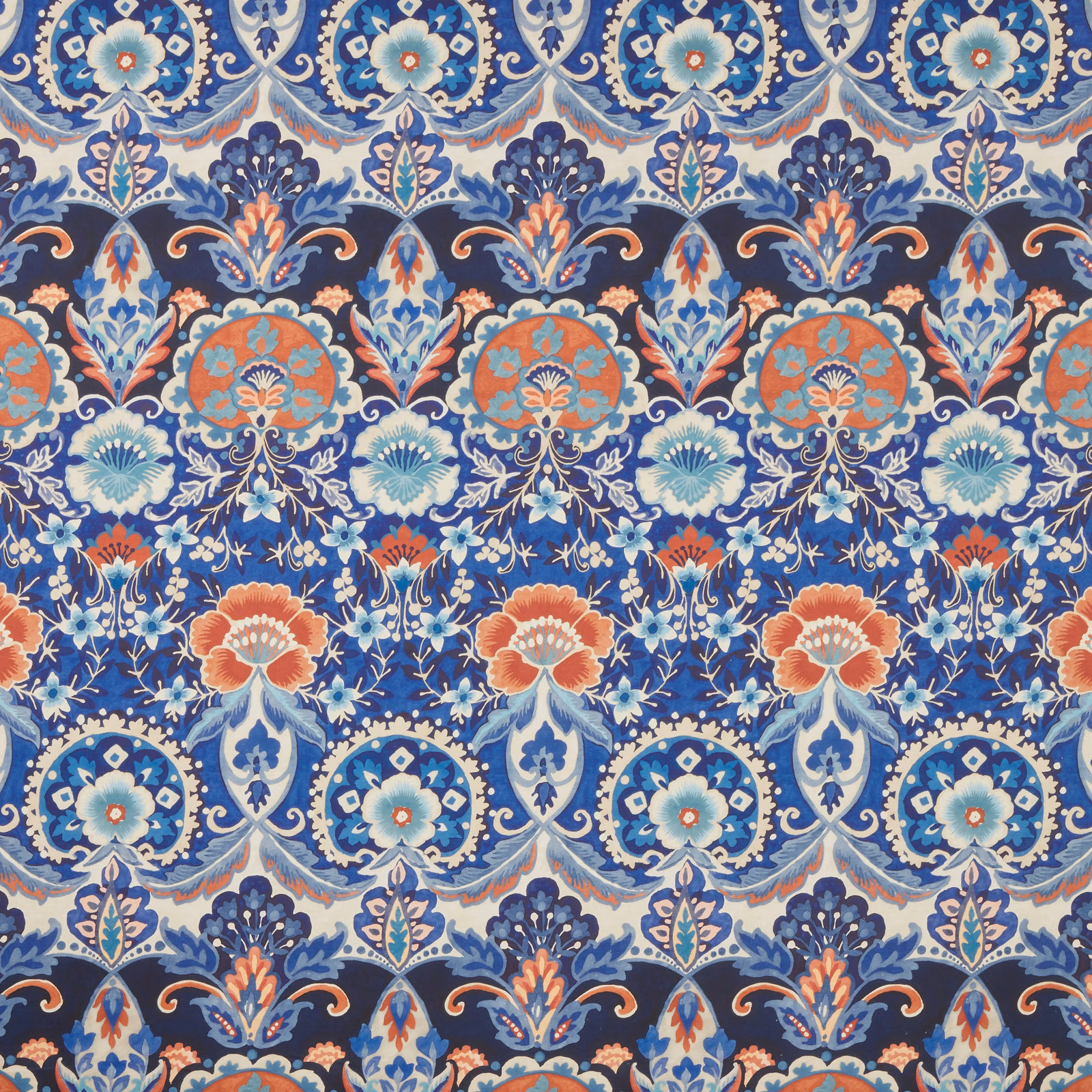 Large-scale batik floral cotton in indigo blue with coral, aqua and cream motifs