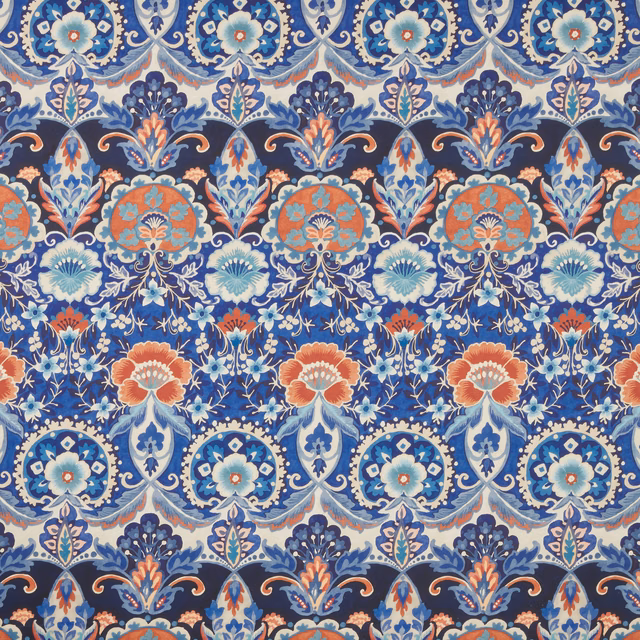 Large-scale batik floral cotton in indigo blue with coral, aqua and cream motifs
