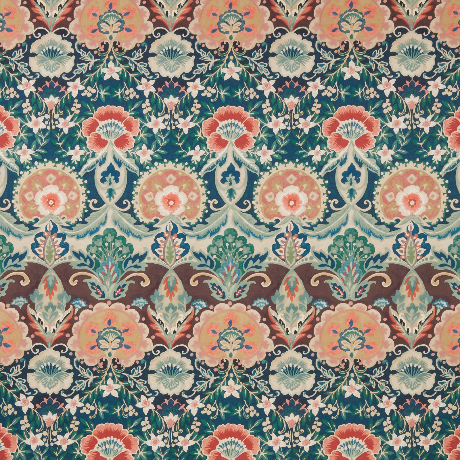 Large-scale floral damask print in deep malachite green with coral, blush and cream motifs