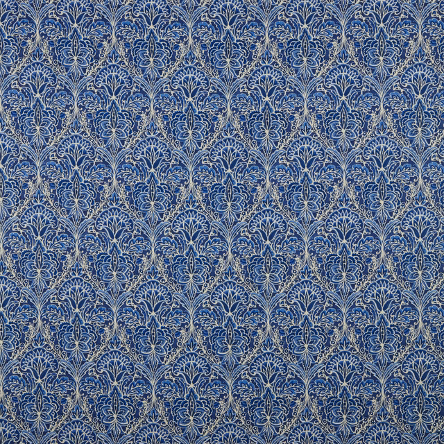 Blue damask cotton fabric with pale outlined scrolling arch motif