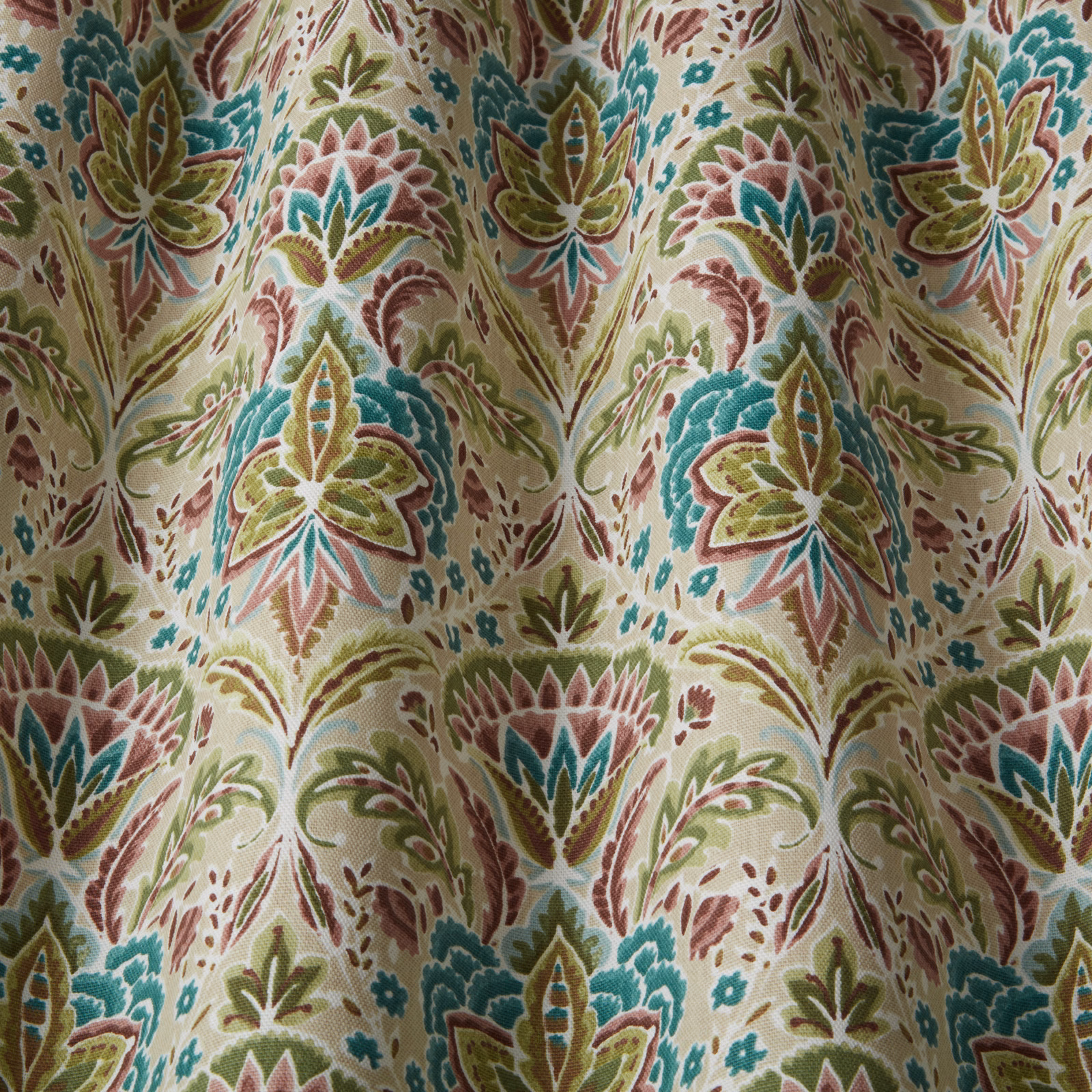 Cream cotton fabric with large botanical wavy motif in orchid pink, teal and sage