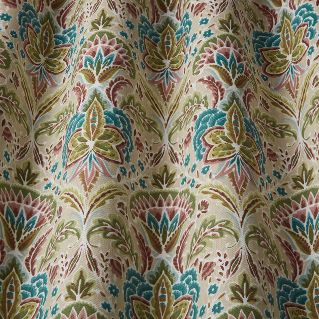 Cream cotton fabric with large botanical wavy motif in orchid pink, teal and sage