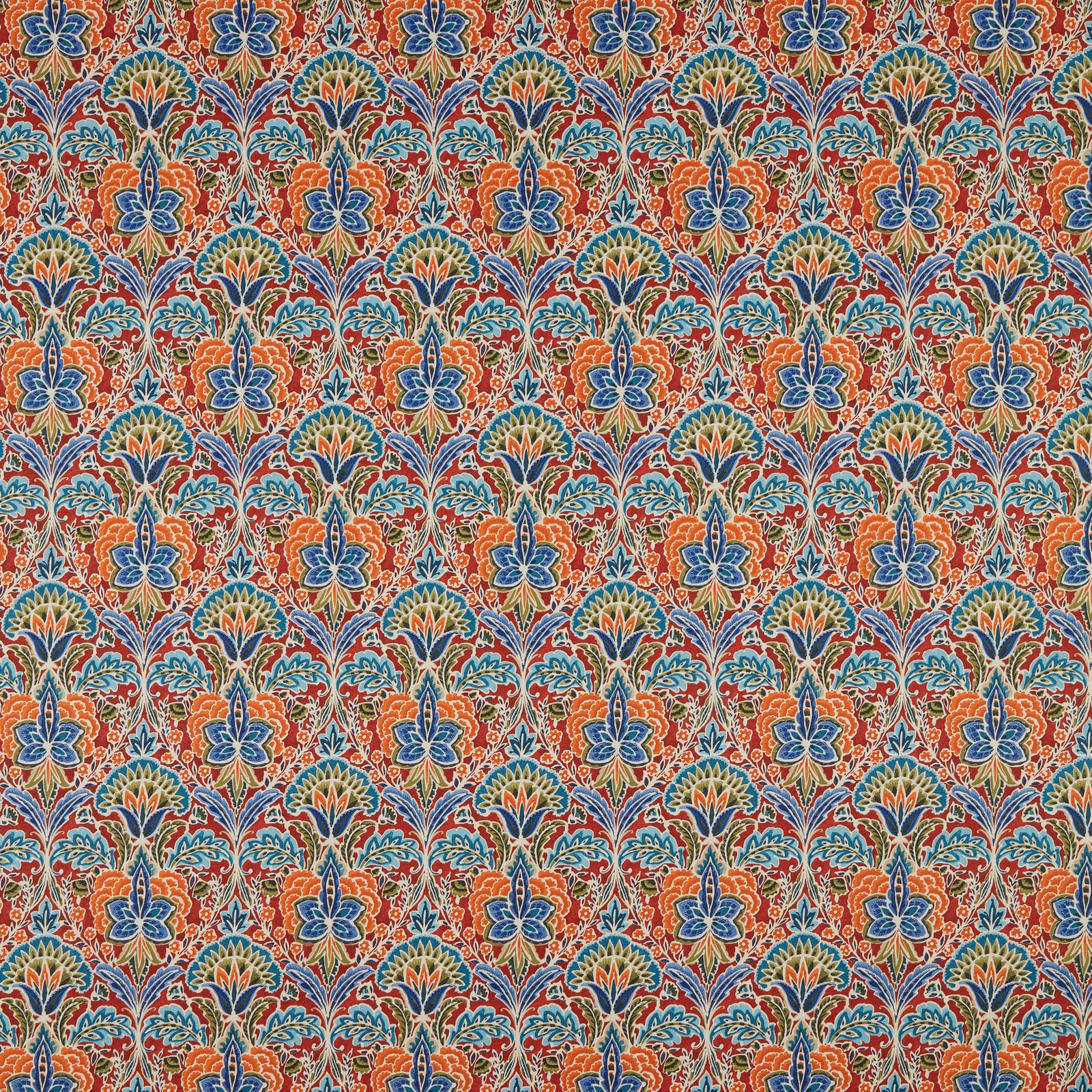 Dense ruby red floral motif with blue and teal accents on cotton fabric