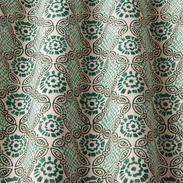 Cream cotton fabric with malachite green medallions and leaf chain pattern