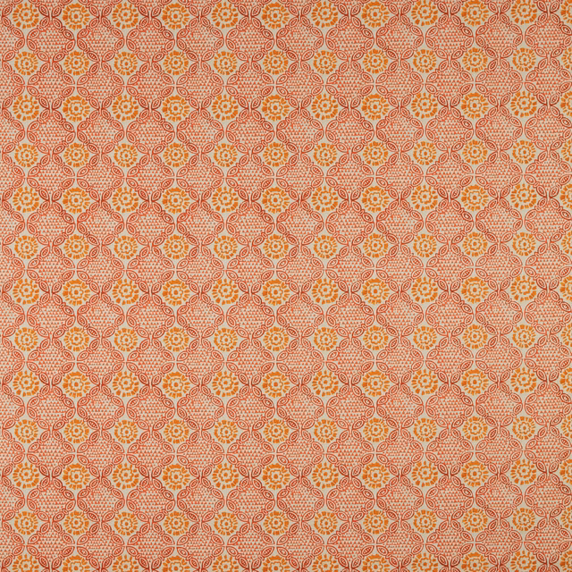 Coral and cream geometric floral cotton swatch with small orange accents
