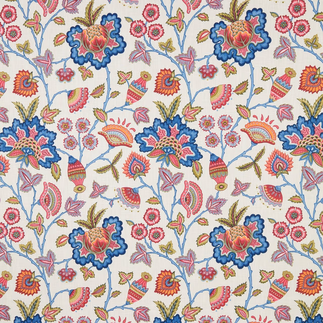 Cream cotton fabric with large folk-floral motifs in hot pink, blue and coral