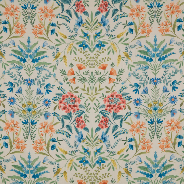 Cream floral chintz fabric with coral, blue and green mirrored botanical motifs