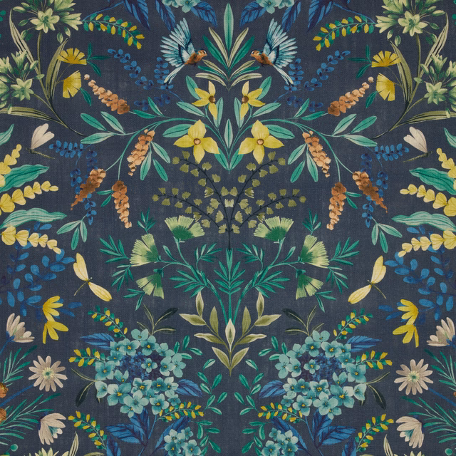 Mirrored botanical fabric on deep delft blue ground with teal, green and yellow flowers