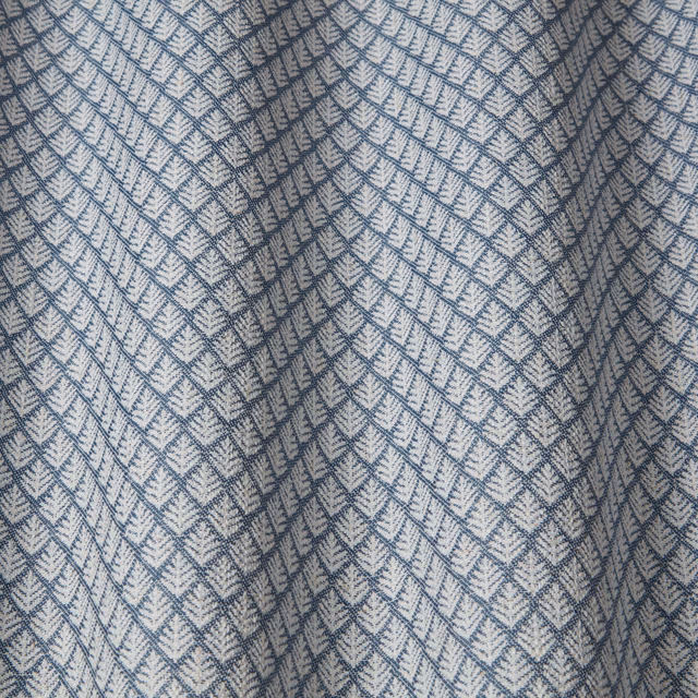 Soft denim blue geometric batik wave fabric with woven diamond pattern