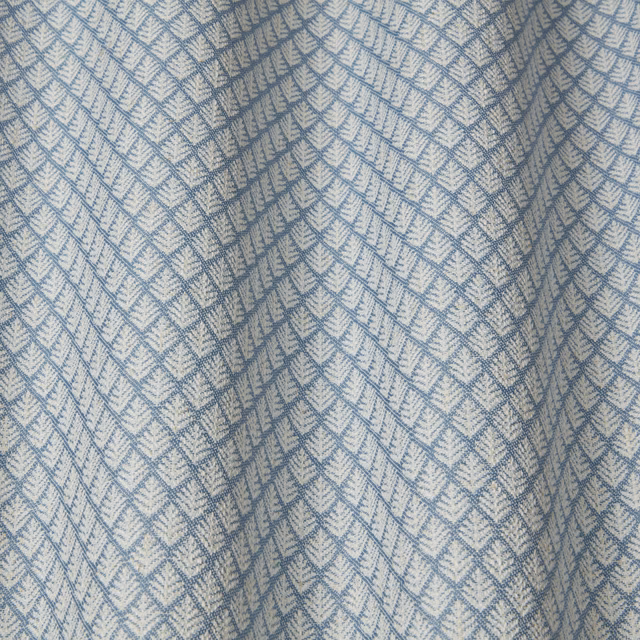 Pale blue geometric woven fabric with small diamond and chevron motif