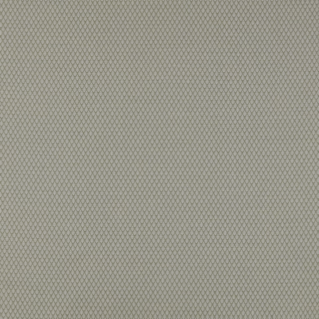 Close-up of muted sage-green geometric fabric with tiny diamond pattern