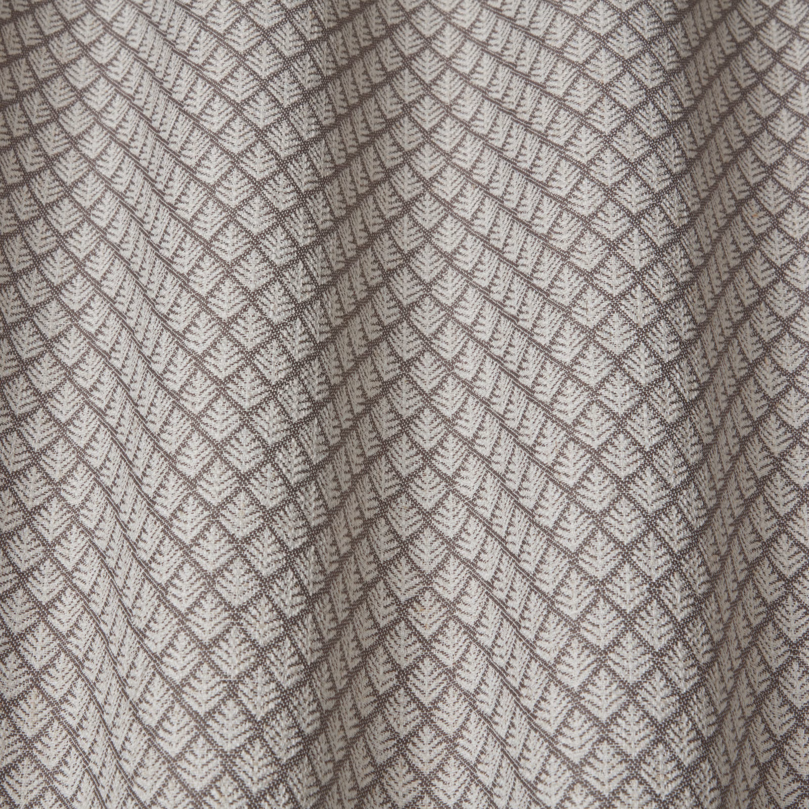 Soft taupe-grey geometric weave with large chevron diamond pattern and textured surface