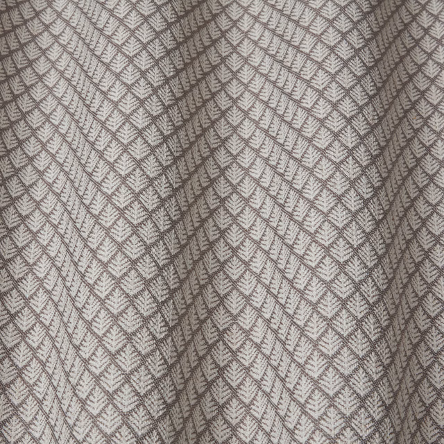 Soft taupe-grey geometric weave with large chevron diamond pattern and textured surface