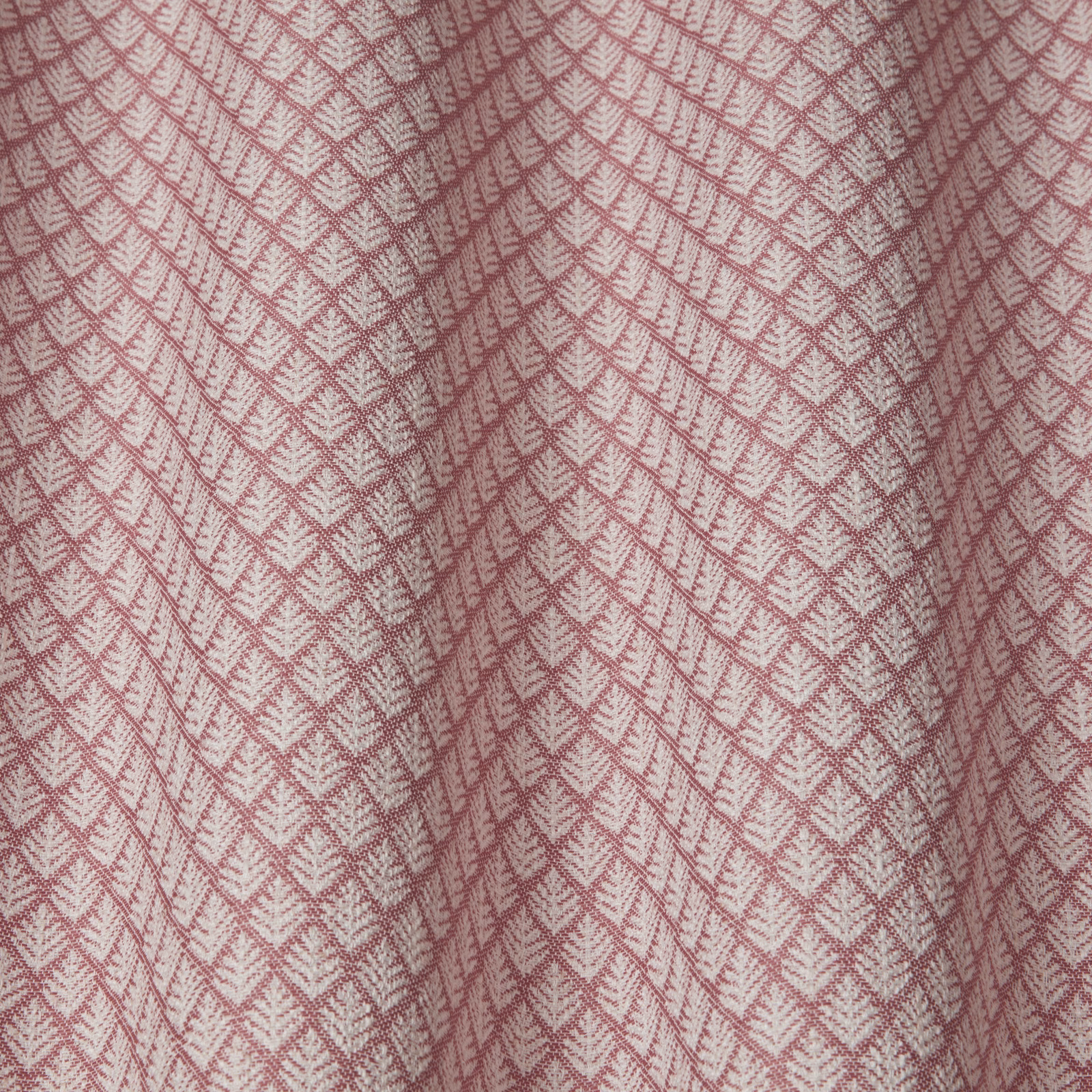 Dusty rose geometric woven fabric with small diamond lattice pattern