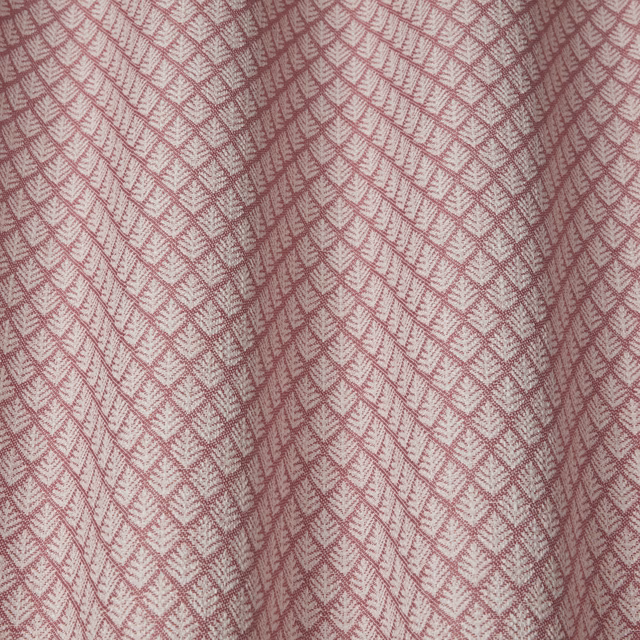 Dusty rose geometric woven fabric with small diamond lattice pattern