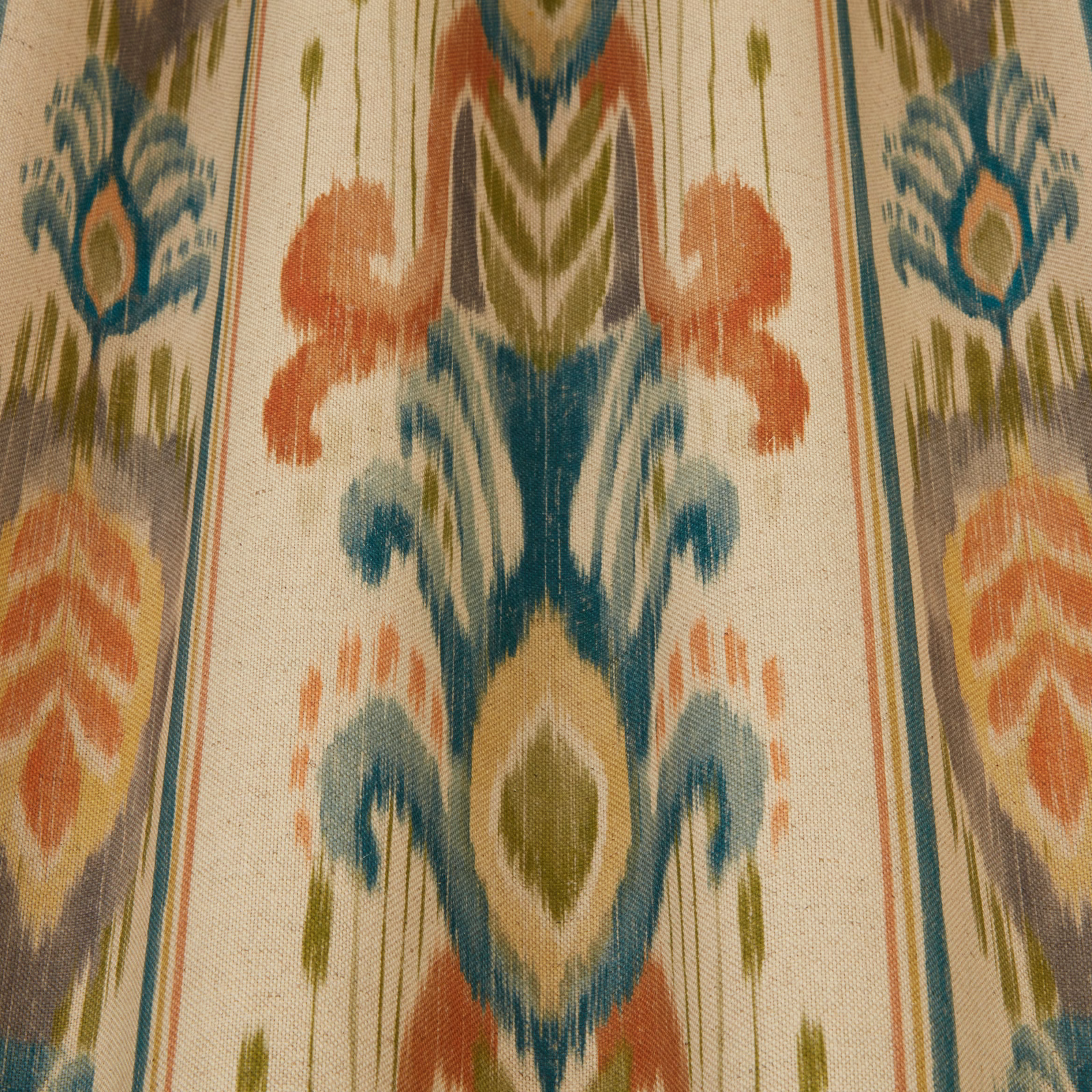 Painterly forest-green and teal damask motif on a linen-textured cream ground