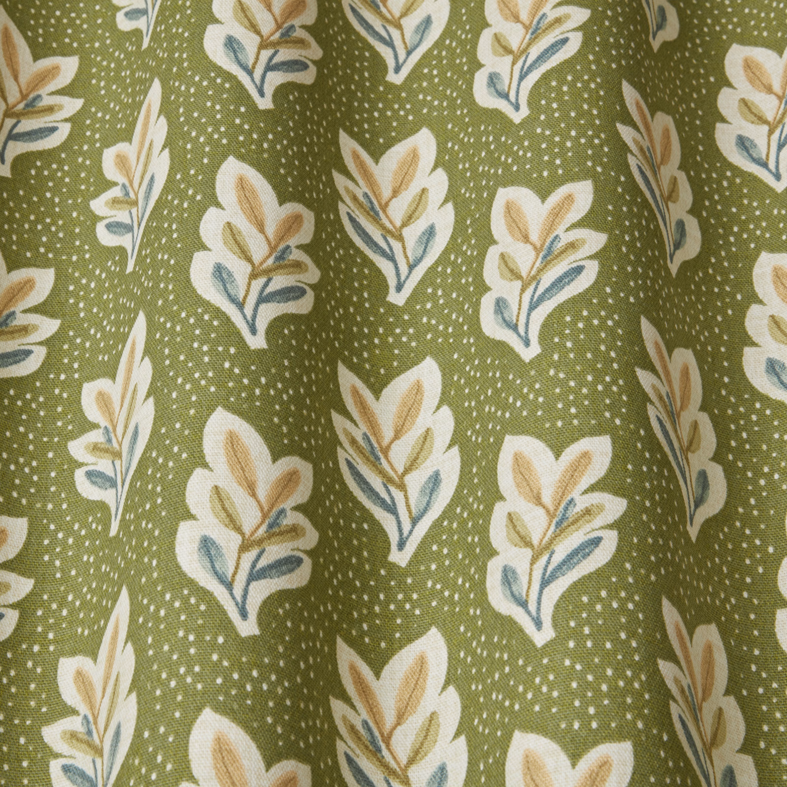 Olive green botanical fabric with cream and tan leaf motifs and dotted ground