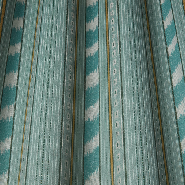 Vertical jade and seafoam striped fabric with zigzag bands and slim gold lines