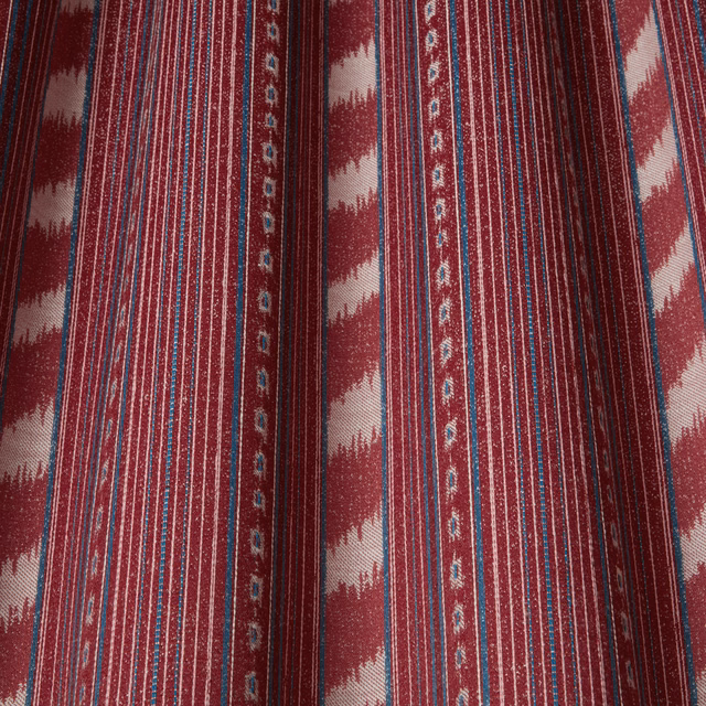 Berry red striped fabric with teal pinstripes and ivory wavy bands