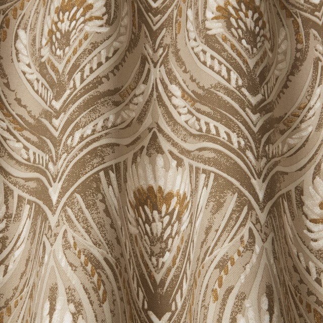Close-up of a bronze taupe wavy leaf pattern with ivory highlights on woven fabric