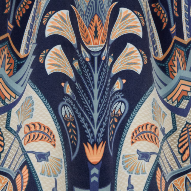 Ornate navy fabric with coral, cream and teal botanical motifs