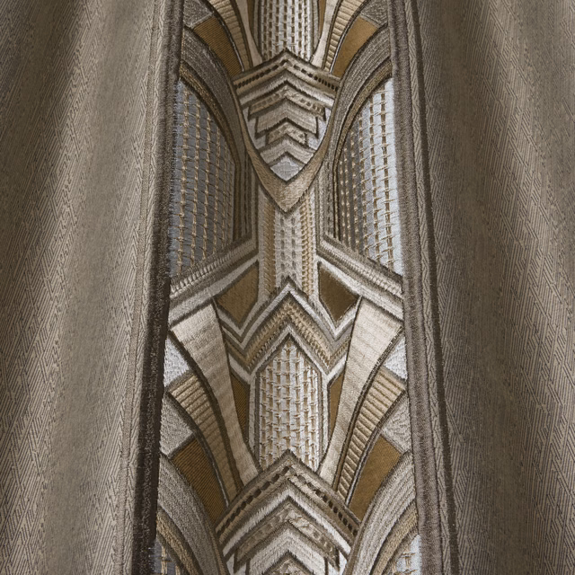 Taupe and opal geometric woven fabric with large Art Deco wave motifs
