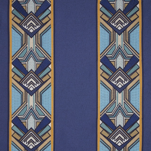 Sapphire blue fabric swatch with geometric border stripes and Art Deco motif