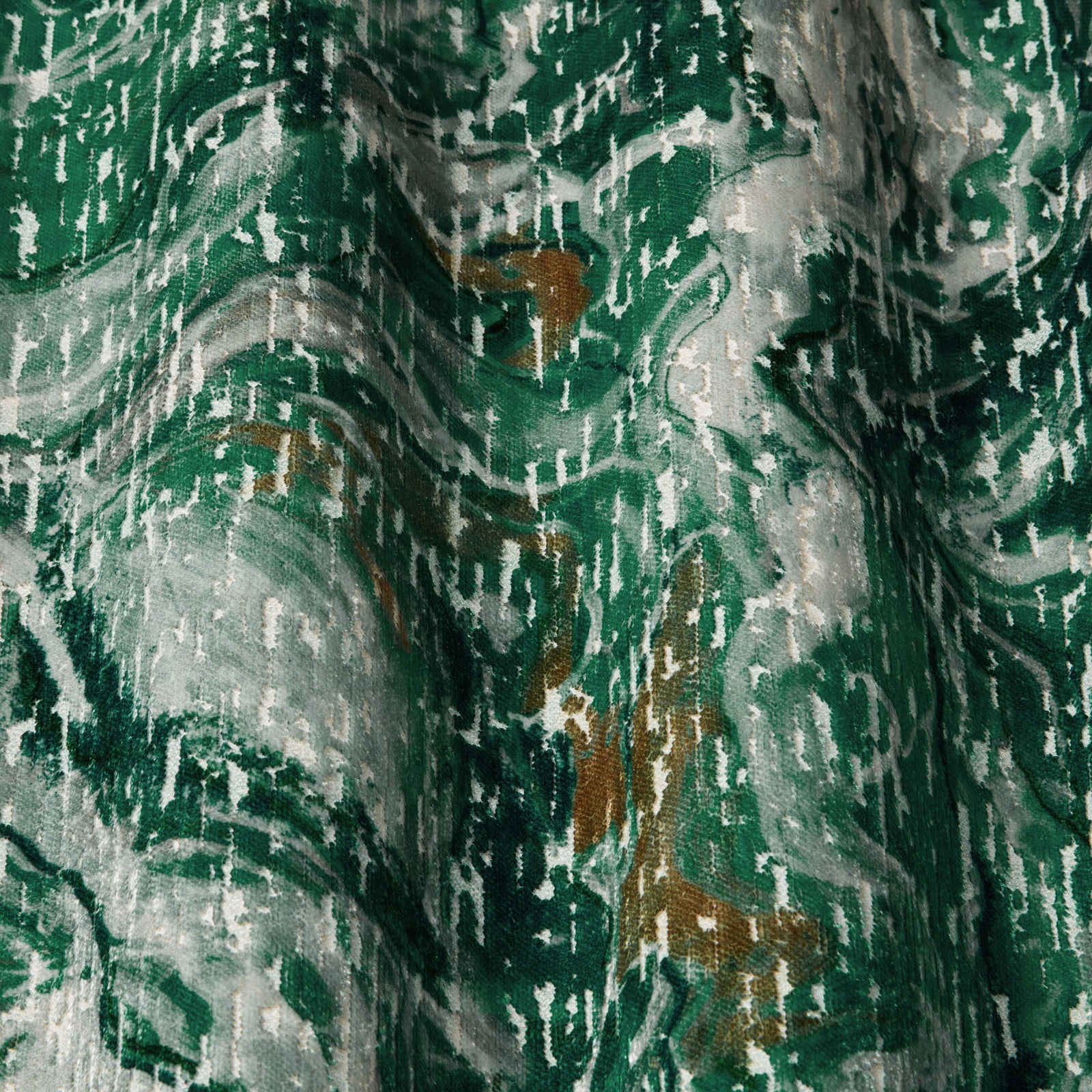 Emerald green abstract woven fabric with silver-grey and brown accents in soft folds