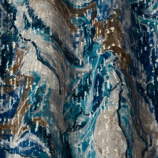Painterly teal, blue, grey and bronze wavy fabric swatch with textured surface