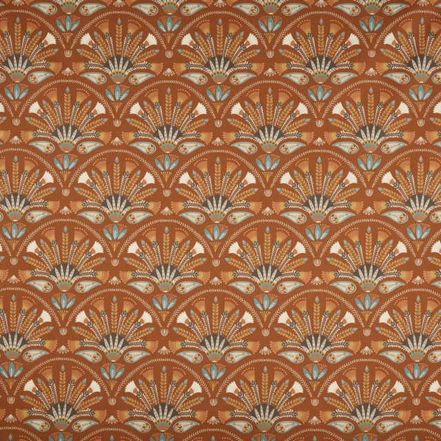 Amber terracotta patterned fabric with fan motifs in cream, teal and soft gold