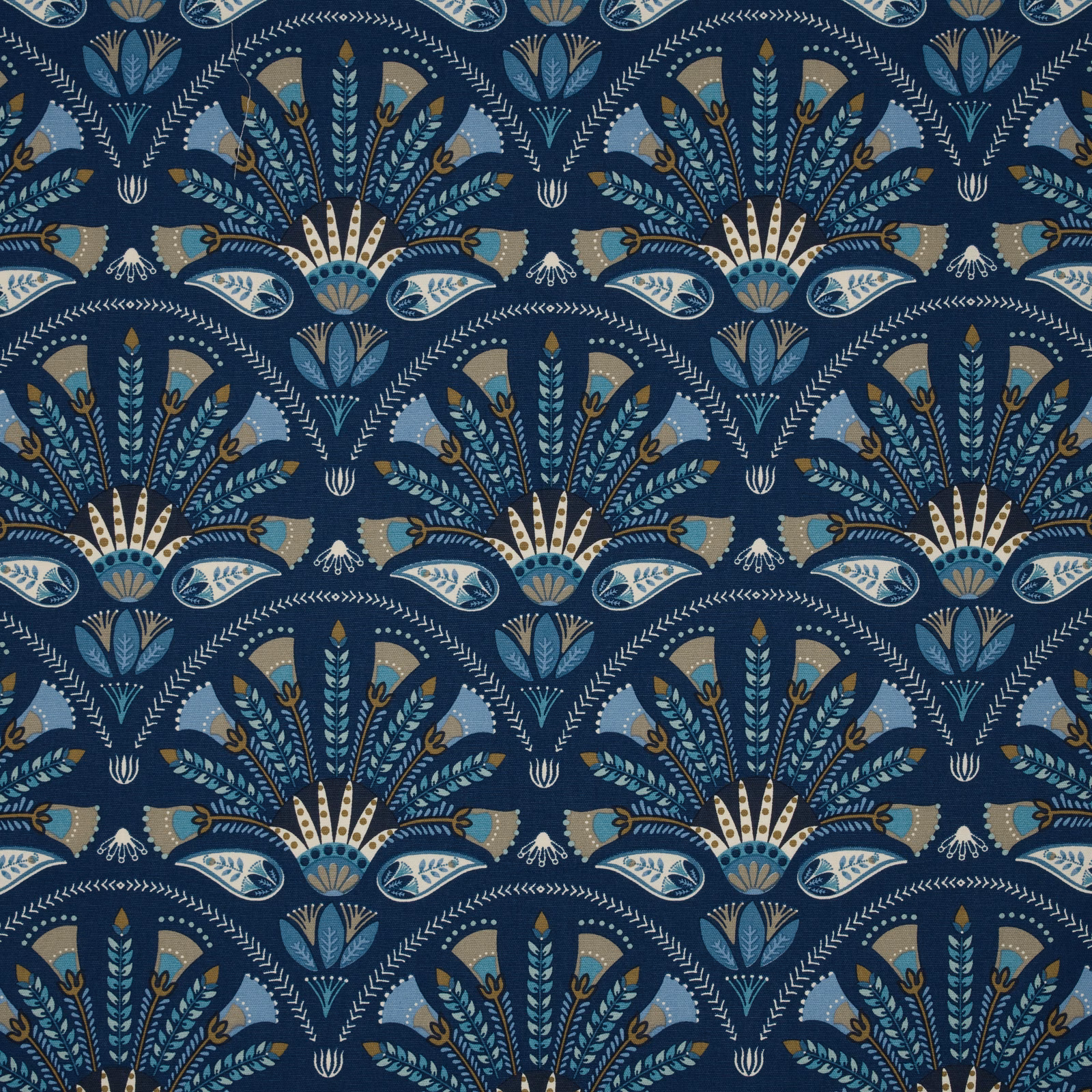 Deep sapphire blue patterned fabric with stylised floral fan motifs in cream, teal and pale blue