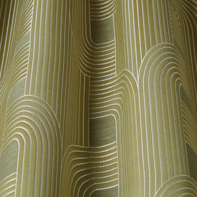 Olive green woven fabric with ivory wavy geometric line pattern and vertical stripes