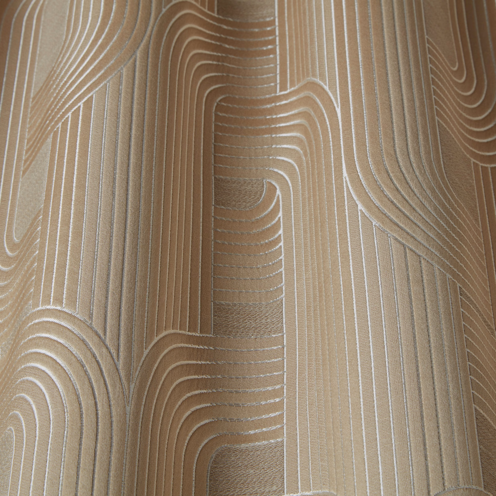 Soft opal beige fabric with raised wavy line embroidery and fine vertical striations