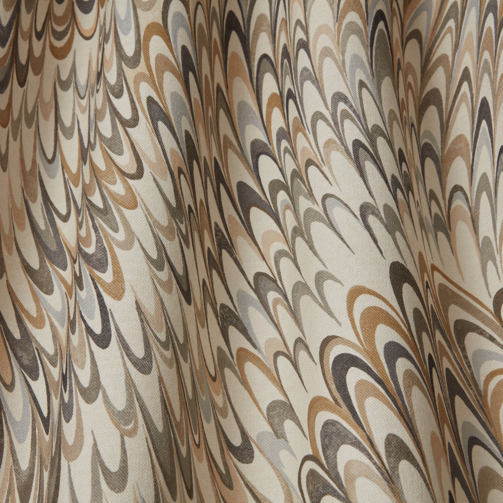 Opal cream woven fabric with large flowing wave motifs in taupe, grey and charcoal