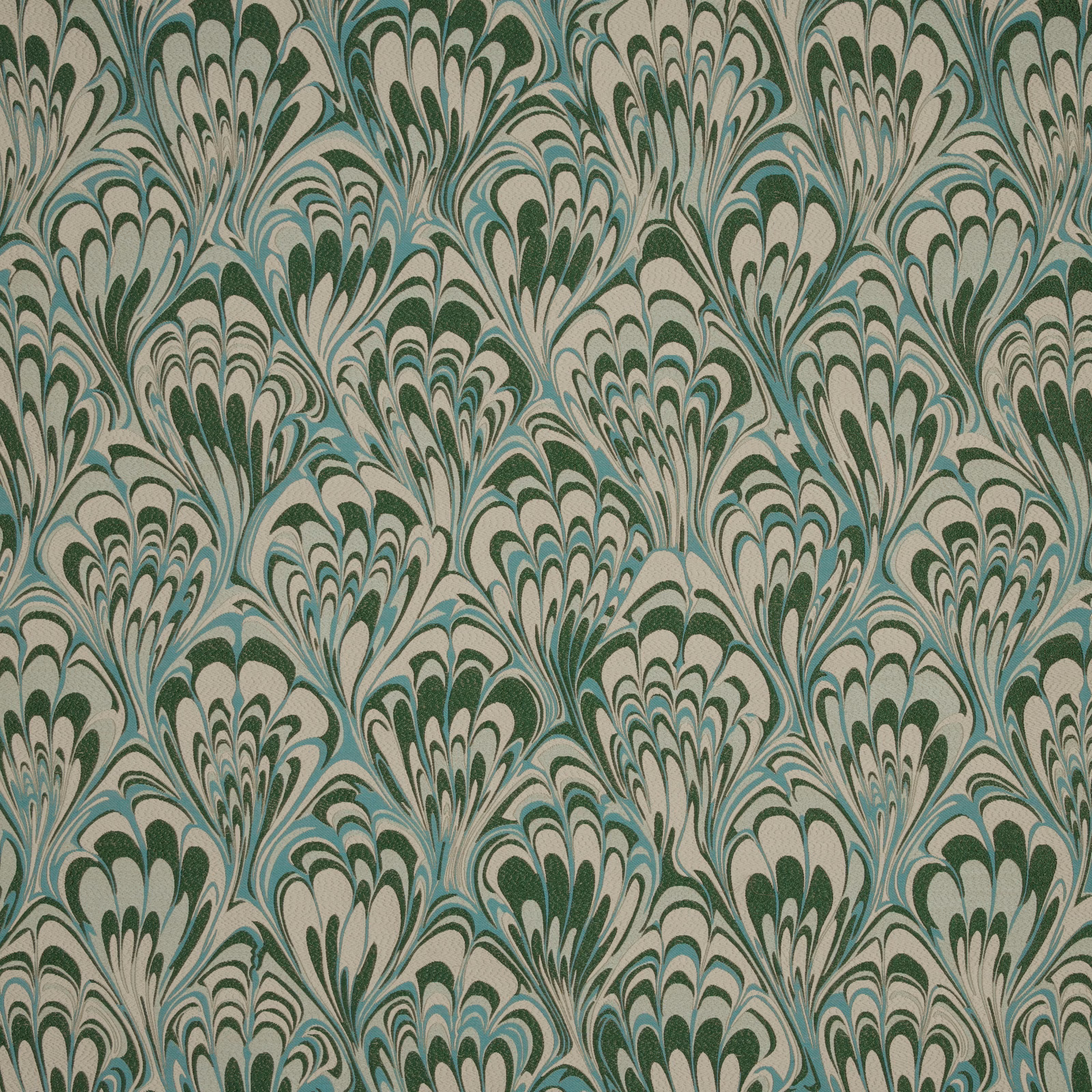 Emerald and aqua feathered floral fabric on a pale cream ground