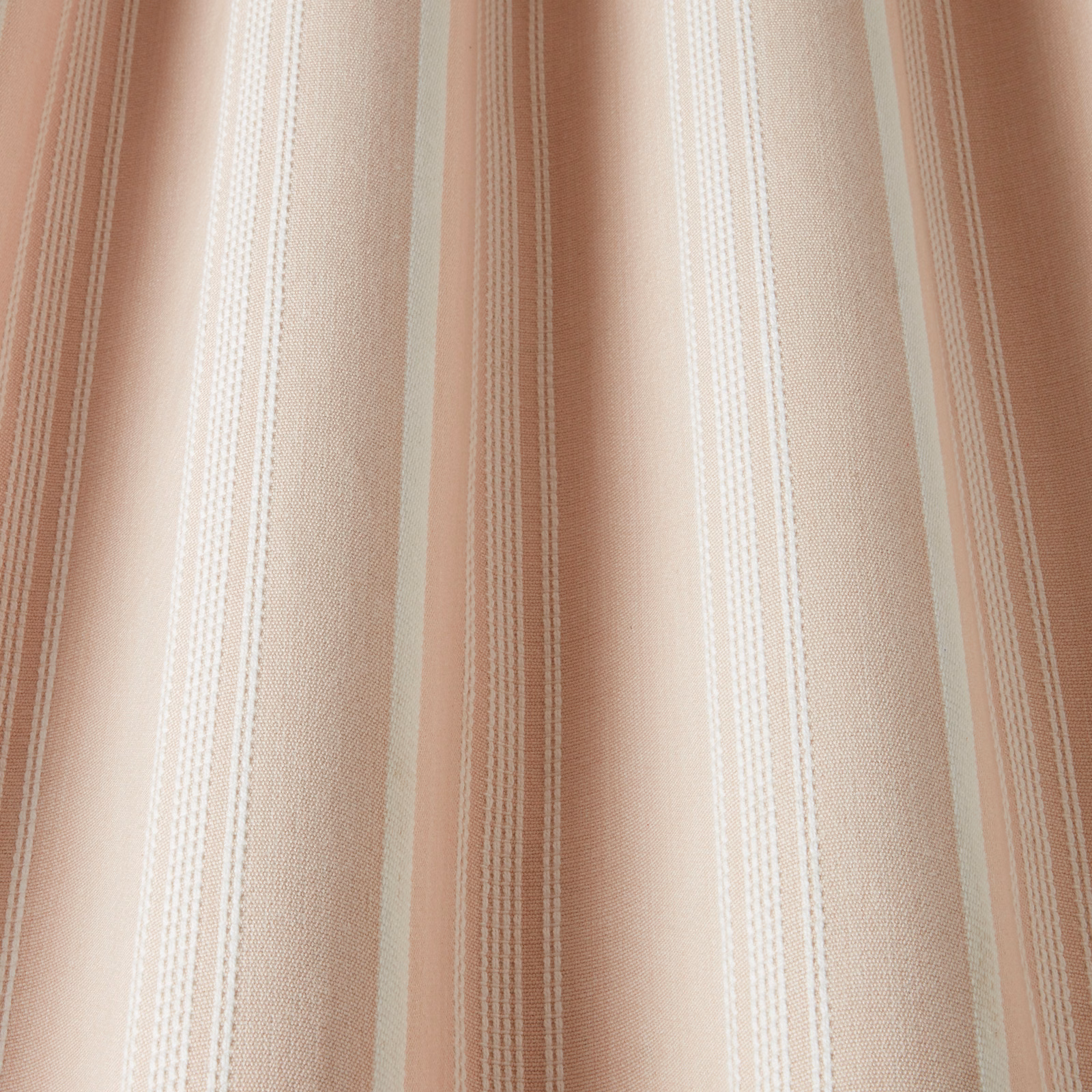 Soft blush and cream vertical stripes on a woven cotton fabric