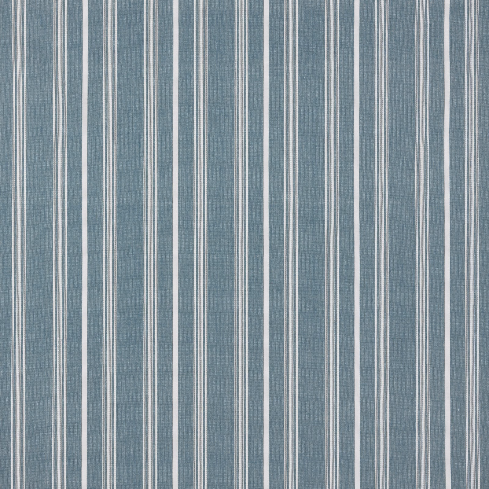 Blue-grey cotton fabric with narrow ivory vertical stripes and fine woven texture