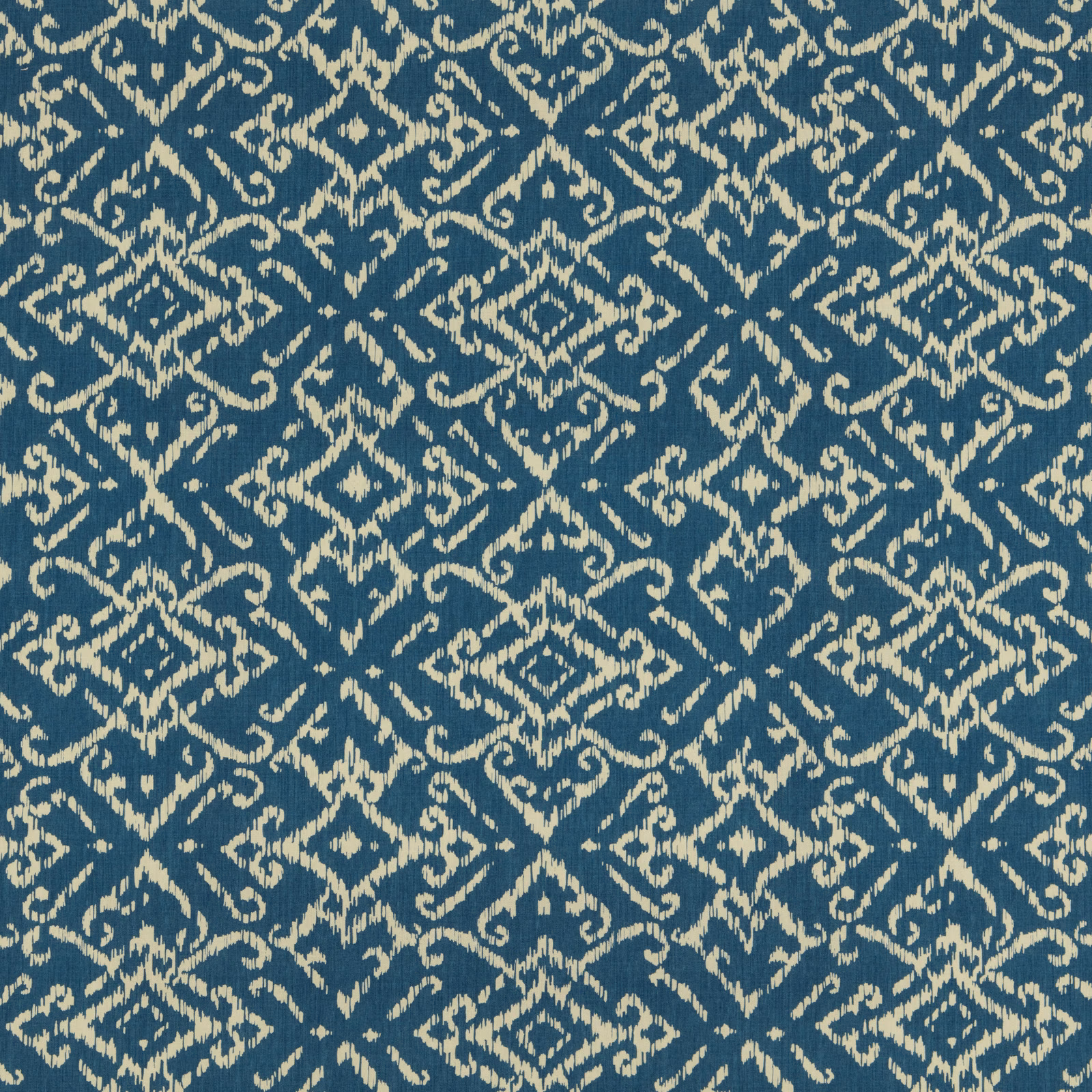 Blue cotton fabric with an ivory geometric lattice and scrolling pattern