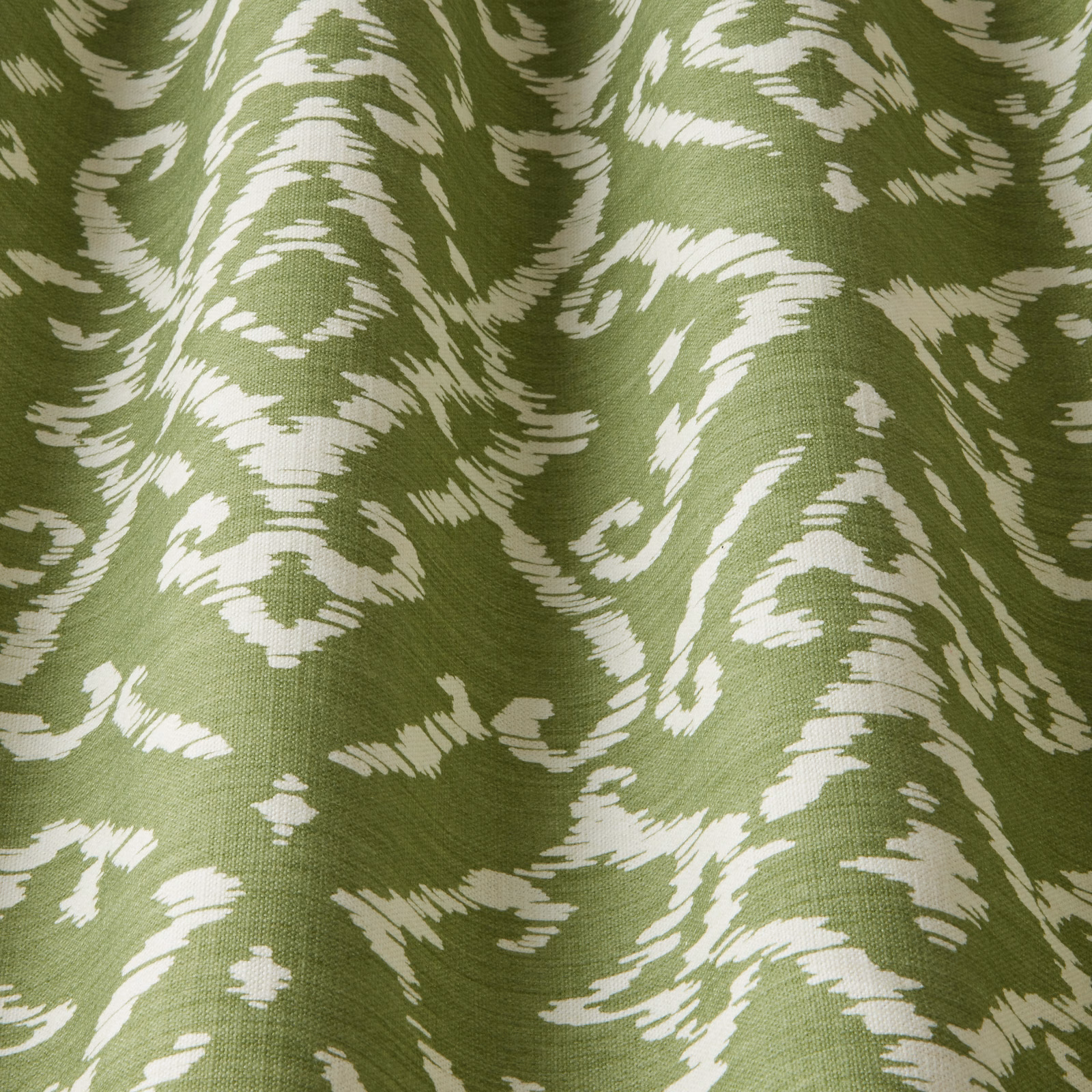 Thyme green cotton fabric with wavy ivory abstract lattice pattern