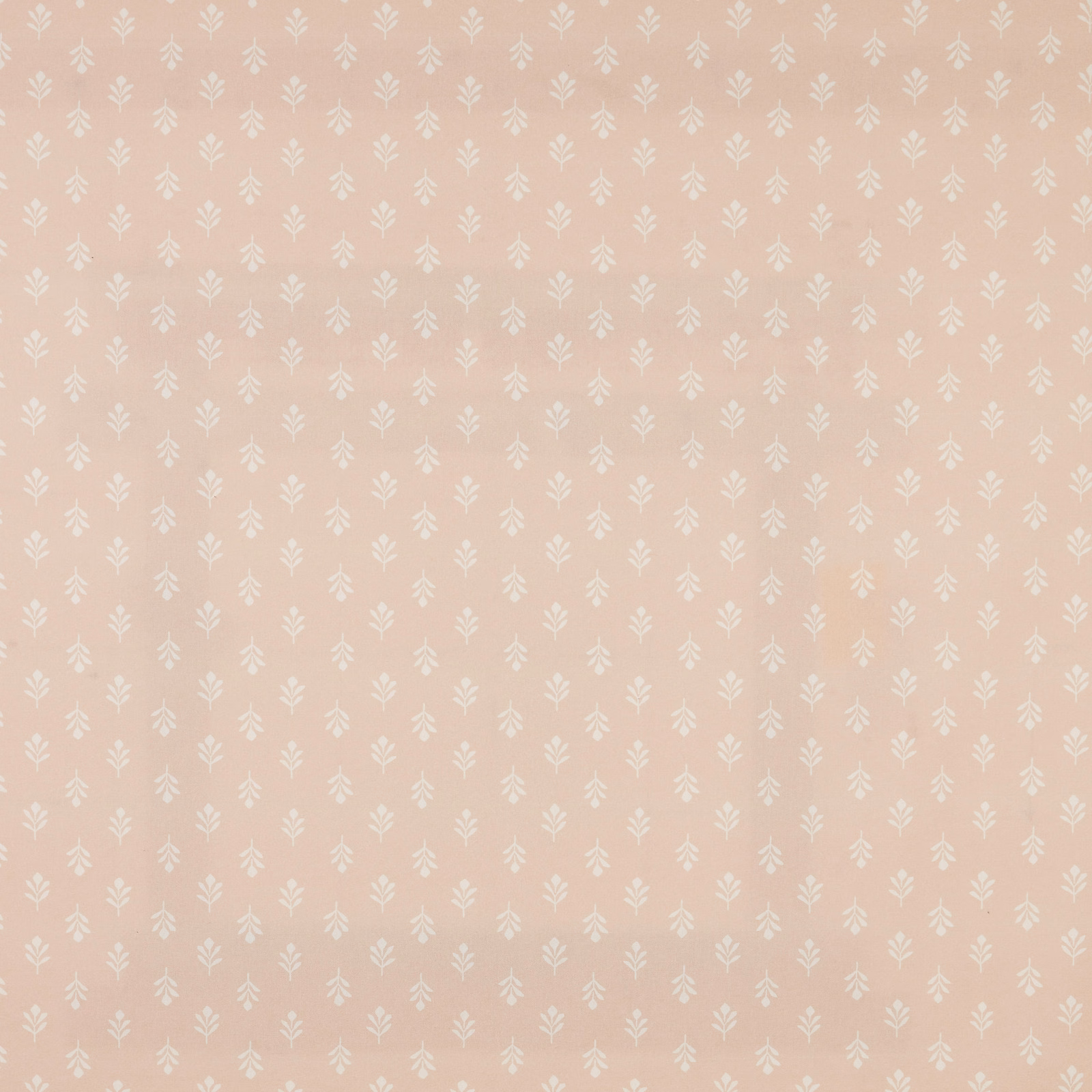 Blush pink cotton fabric with small ivory leaf motif and neat all-over repeat
