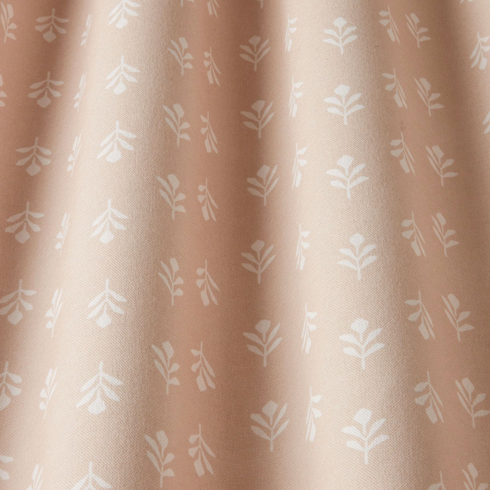 Blush pink cotton fabric with small white botanical leaf print
