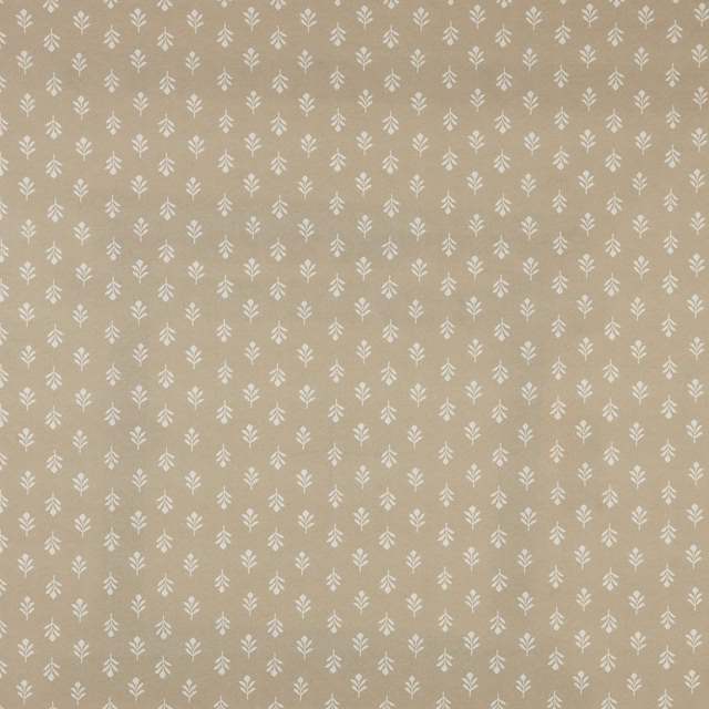 Small cream leaf motif printed on soft beige cotton fabric