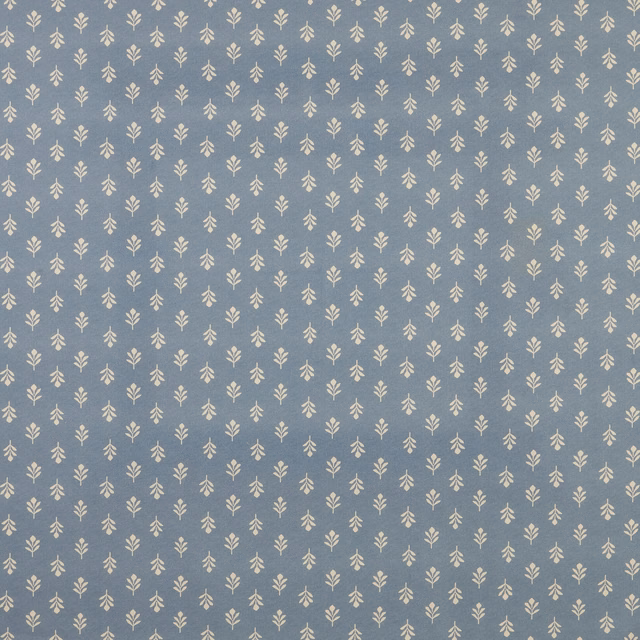 Cornflower blue cotton fabric with tiny cream leaf sprig repeat