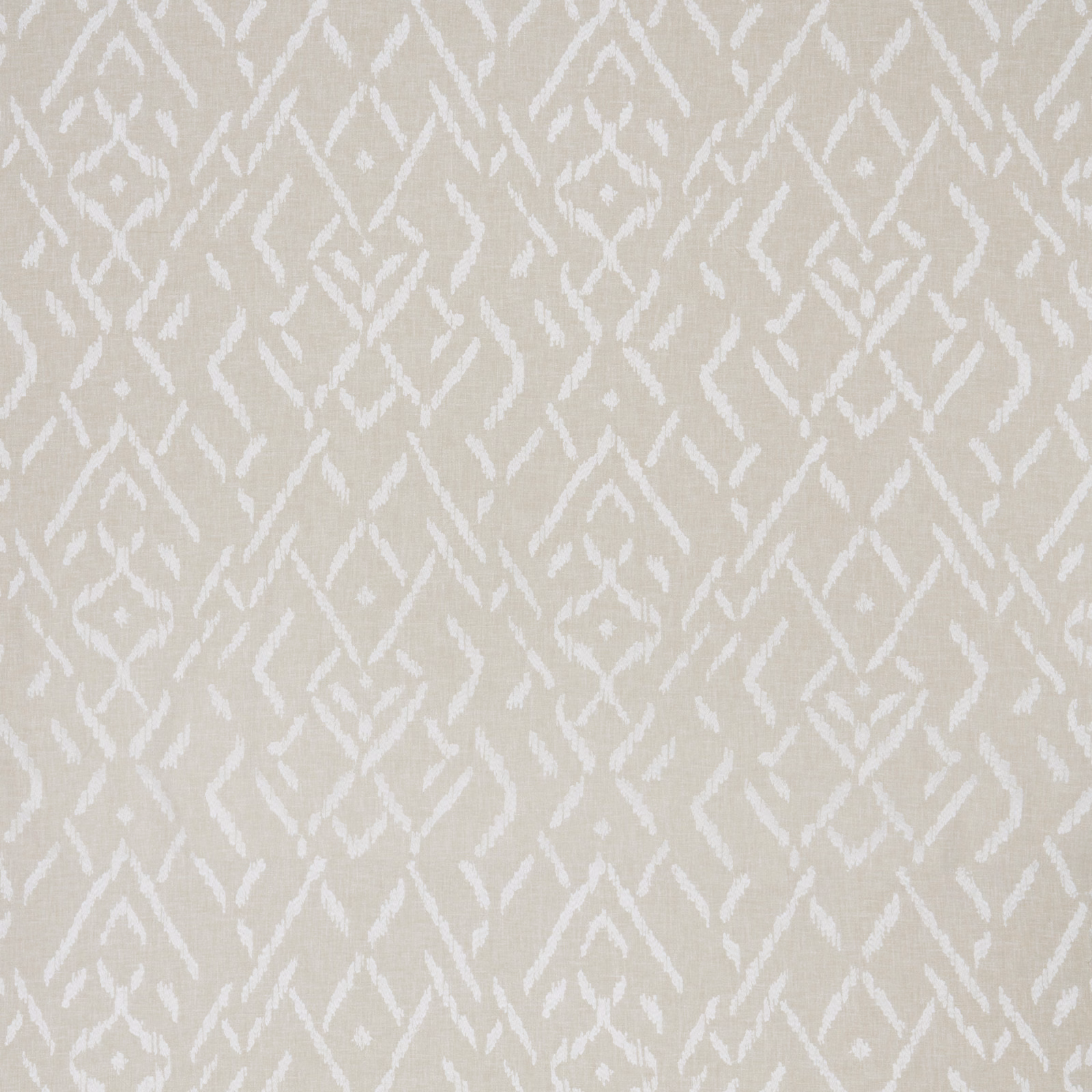 Pale cream cotton fabric with white geometric parterre motif and soft woven texture