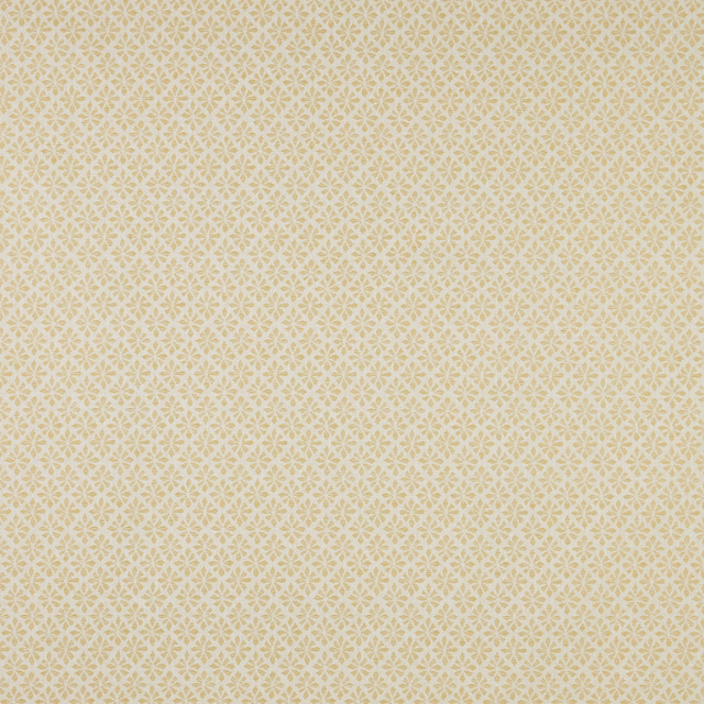 Pale barley geometric cotton fabric with small repeating cream motif
