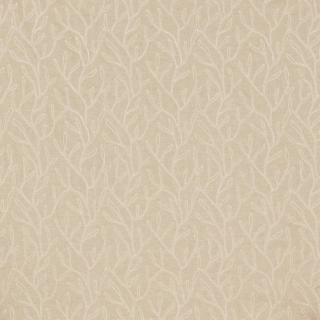Cream cotton fabric with a fine white twig and leaf repeat