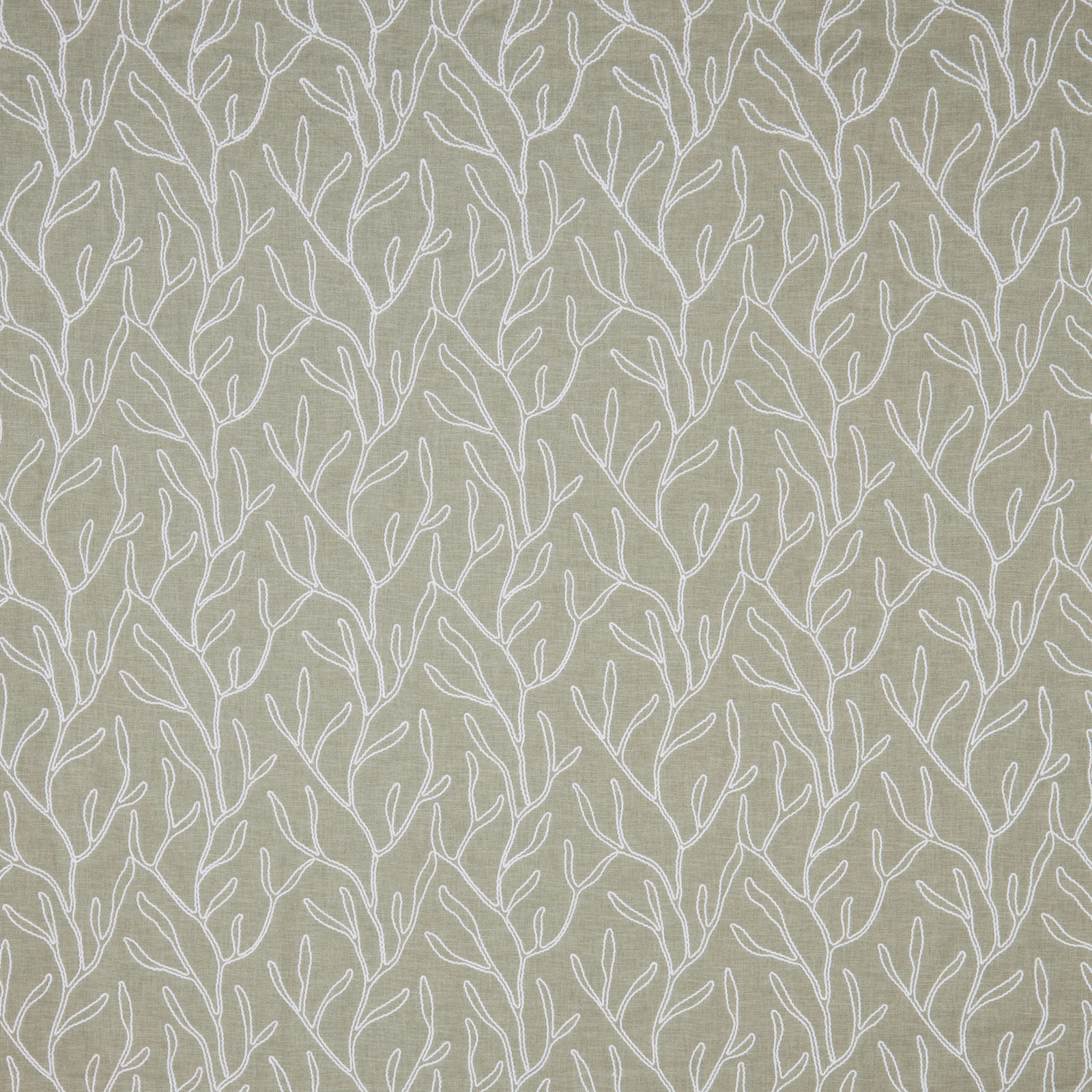 Sage green cotton fabric with white trailing leaf motif and textured weave